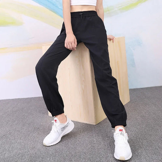 Joggers Deportivos de Mujer – Cintura Elástica y Secado Rápido (Estilo Holgado)